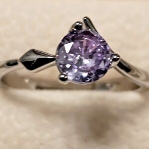 Elegant Silver and Purple Gemstone Ring